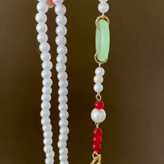 Collier papillon en perles avec pompon rouge de la dynastie Ming vidéo